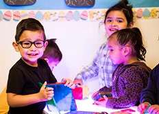 Kids playing at learning at Yuma Preschool.