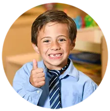 Kid smiling at Yuma Pre-School